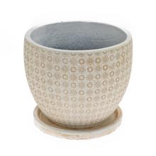 Kvetináč s miskou v krémovej farbe s dekoratívnym vzorom.