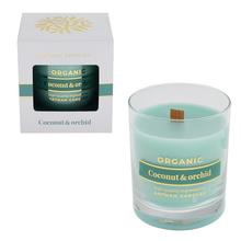 Sviečka v skle s vôňou kokosu a orchidey.