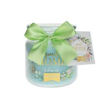 Malá celoročná sviečka s vôňou mäty v skle.