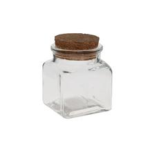 Sklenená fľaša s korkovým uzáverom, objem 80ml.