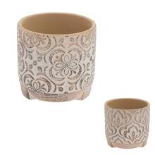 Keramický kvetináč s dekoratívnym vzorom v terakotovej a krémovej farbe.