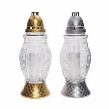 Kahanec z ryhovaného skla s kovovým vrchnákom v zlatej a striebornej farbe.