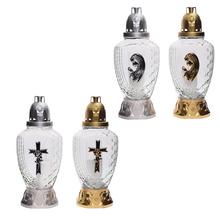 Náhrobné sviečky v čírom skle s krížom.