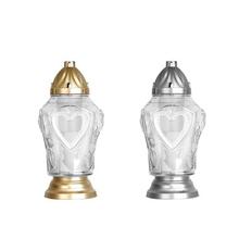 Náhrobné sviečky v tvare srdca z číreho skla.