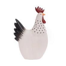 Bielo-čierna drevená sliepka.