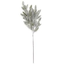 Zelená zasnežená čečina konár s dĺžkou 76 cm.