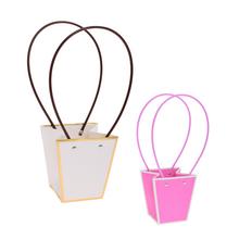 Taška na kvety s dvoma rúčkami v bielej a ružovej farbe.