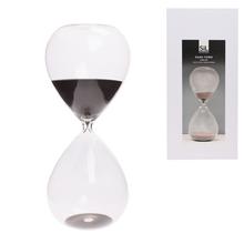 Pieskové hodiny zo skla s čiernym pieskom.