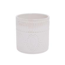 Keramický obal na kvetináče v perleťovej farbe.