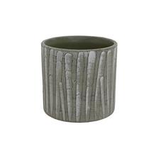 Zelený keramický kvetináč s textúrou.