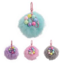 Prívesok chlpáč v rôznych farbách s guľôčkami.