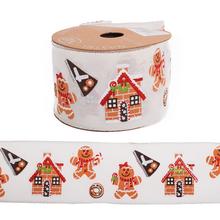 Vianočná stuha s perníkovými domčekmi a postavičkami.