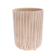 Béžový obal na kvetináče s textúrou.