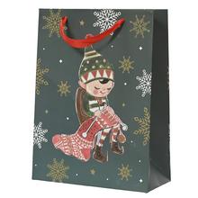 Vianočná papierová taška s obrázkom elfíka.