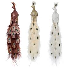 Páv na štipci v mixe farieb hnedá, biela a zlatá s glitrami a perím.