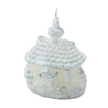 Biely domček kostol so sviečkou