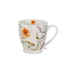 Keramická šálka s kvetinovým vzorom na stopke, objem 510ml.