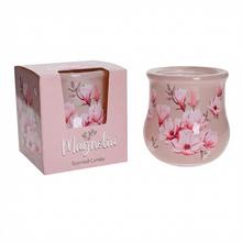 Voňavá sviečka magnólia v sklenenom obale.