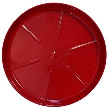 Červená okrúhla miska pod kvetináč.