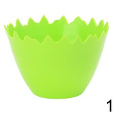 Dve farebné misky vajce v žltej a zelenej farbe.