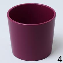 Sada kvetináčov v rôznych farbách.