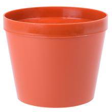 Kvetináč v terakotovej farbe s priemerom 12 cm.