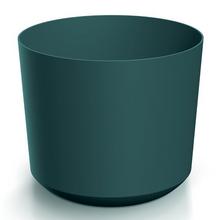 Okrúhly obal na kvetináče v oceánovej farbe.