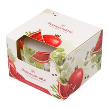 Aromatická sviečka s vôňou granátového jablka v sklenenom obale.