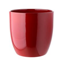 Jednofarebný keramický obal v bordovej farbe.