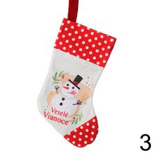 Vianočná ponožka s motívom veselých Vianoc.