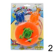 Hra ŽABKY s farebnými žabkami a kruhom.