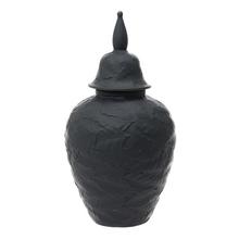 Čierna keramická dóza s poklopom.