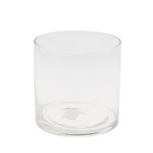 Priehľadná sklenená váza v tvare valca.