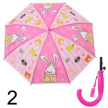 Farebný dáždnik s píšťalkou a detskými motívmi.