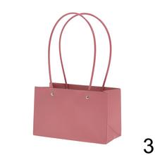 Rôzne farby tašiek s dlhými uchami.