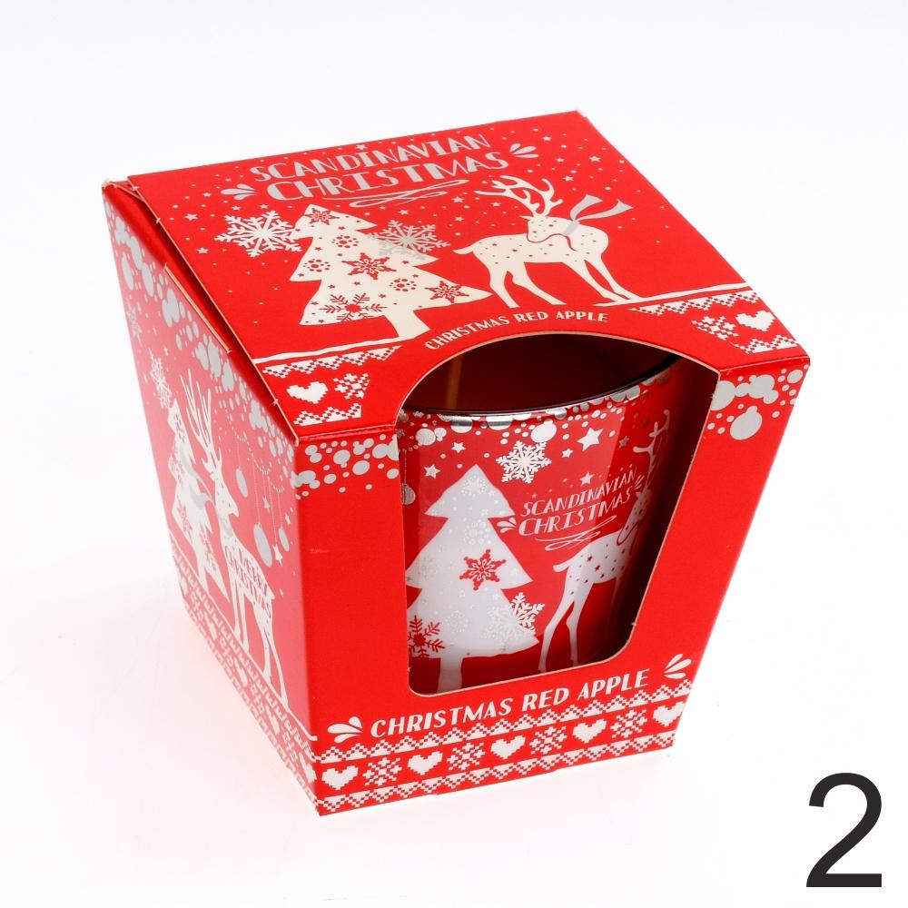 Voňavá sviečka v skle s vianočným dizajnom.