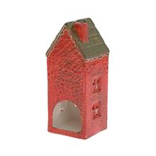 Červený a zelený porcelánový domček na sviečku.