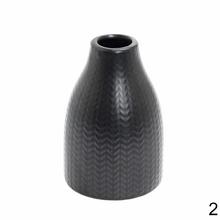 Keramická váza v mixe farieb, výška 14 cm.