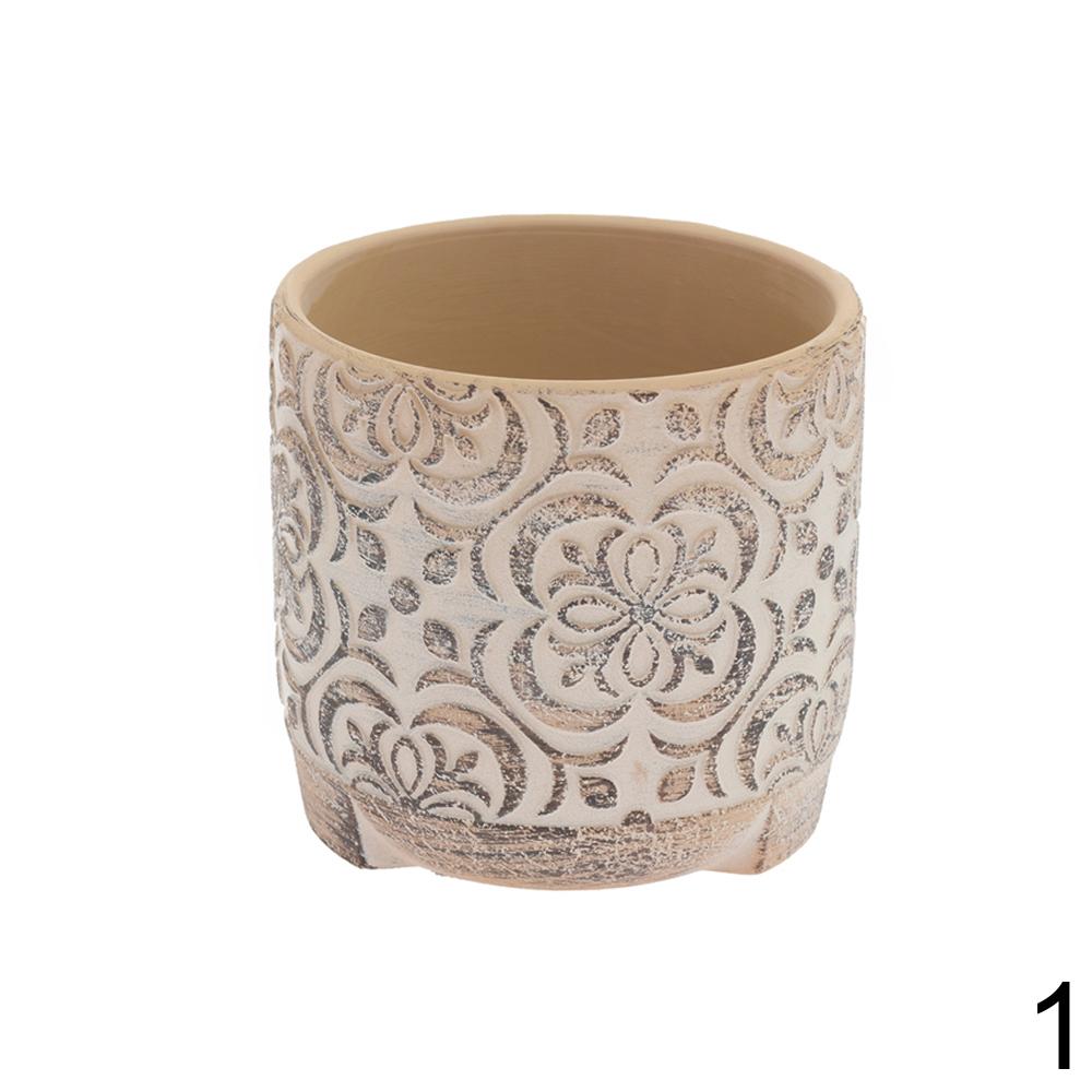 Keramický kvetináč s dekoratívnym vzorom v terakotovej a krémovej farbe.