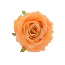 Umelá ruža v oranžovej farbe s trblietavým efektom.