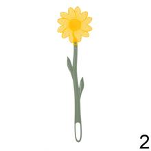 LAPKA NA MUCHY v tvare kvetu s dlhým zeleným držadlom.