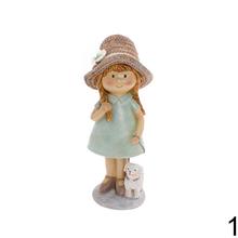 Detské figúrky chlapca a dievčaťa so psíkom.