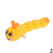 Modrý červík na kľúčik s usmievavou tvárou.