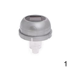 Solárny vrchnák pre náhrobné sviečky, strieborný a zlatý.