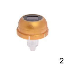 Solárny vrchnák pre náhrobné sviečky, strieborný a zlatý.