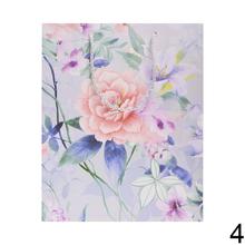 Darčeková taška s kvetinovým vzorom a trblietkami.