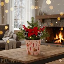 Obal na kvetináč s vianočným motívom zimnej krajiny.