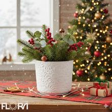 Biely kvetináč s vzorom vločky.