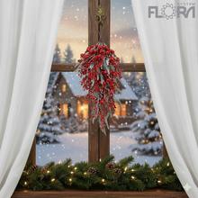 Záves s červenými bobuľami a sivým konárom.