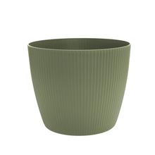 Okrúhly obal na kvety v sivej a zelenej farbe.